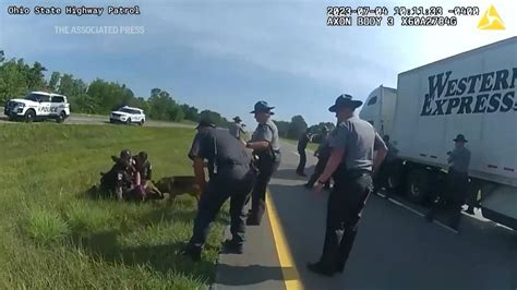 Ohio officer fired after letting his police dog attack a surrendering truck driver