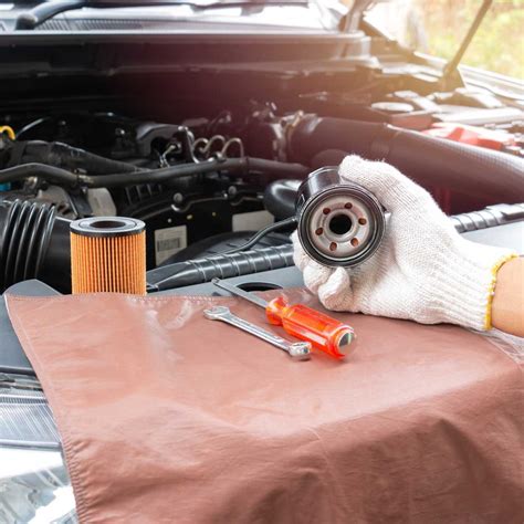 Oil change and filter. Tightening torque: 30 lbf∙ft (40 N∙m, 4.0 kgf∙m) Pour the recommended engine oil into the engine. Engine oil change capacity (including filter): 4.4 US qt (4.2 L) Reinstall the engine oil fill cap securely and start the engine. Run the engine for a few minutes, and then check that there is no leak from the drain bolt or oil filter. 