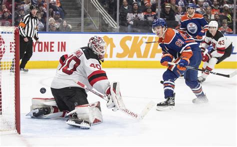 Oilers win 7th straight, beating Devils 4-1 to reach .500 at 12-12-1