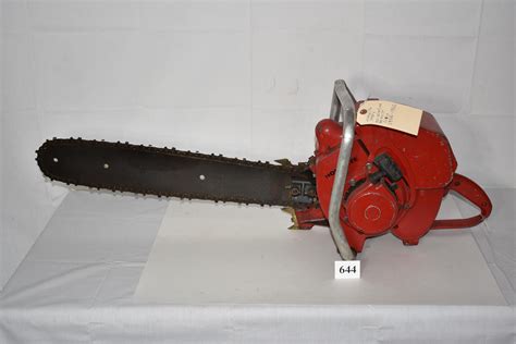 A Homelite chainsaw generates dust and chips as it cuts through wood. Much of this debris collects on the saw's surfaces and can clog cooling vents. The chain rides through an oil bath as it circulates around the guide bar. Sticky oil exacerbates debris collection. Use a brush or compressed air to remove dirt from the motor's cooling vents and ...