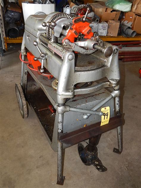 ADDING POWER TO PIPE THREADING: MODEL 400. Hand threading was a slow, tedious process — until Ridge Tool Company developed a better solution: an electric portable power drive that turned the material while hand-held tools cut, reamed and threaded the pipe. Known as the RIDGID 400 Power Drive, the tool was an instant success.