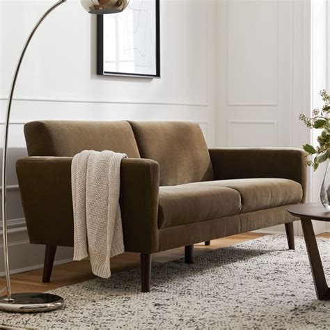 The West Elm Drake Sofa is perfect for those wanting a firm seat. The Spruce / Katie Begley. The support comes from the high-gauge springs and fiber-wrapped, high-resiliency polyurethane foam core. The detachable back cushions are filled with fiber and foam to provide back support. They are reversible, which we loved.. 