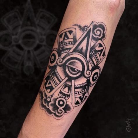 The ollin tattoo is a visual embodiment of the concept of movement and change. Derived from the Nahuatl language of the Aztecs, "ollin" translates to "movement" or "motion." This symbol is often associated with the Aztec god Quetzalcoatl, who embodies the transformative forces of creation and destruction.. 