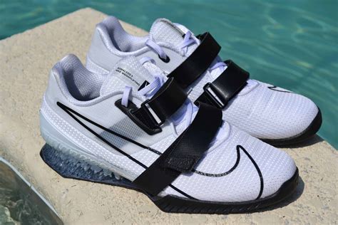 Olympic lifting shoes. Weightlifting shoes are one piece of equipment that recreational and competitive lifters often wear during squats as well as the Olympic weightlifting lifts (clean & jerk, snatch). In the following sections of this article, we will explore what weightlifting shoes are, what the available research reveals about their effects, … 