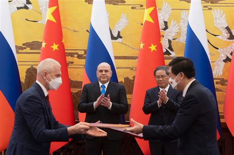 On Beijing visit, Russian prime minister says pressure from West is strengthening ties with China