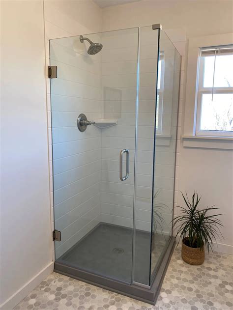 Onyx collection showers. Slabs with angles and curves are priced based on thickness, square inches, which sides are finished, and a setup charge based on the complexity of the shape. 