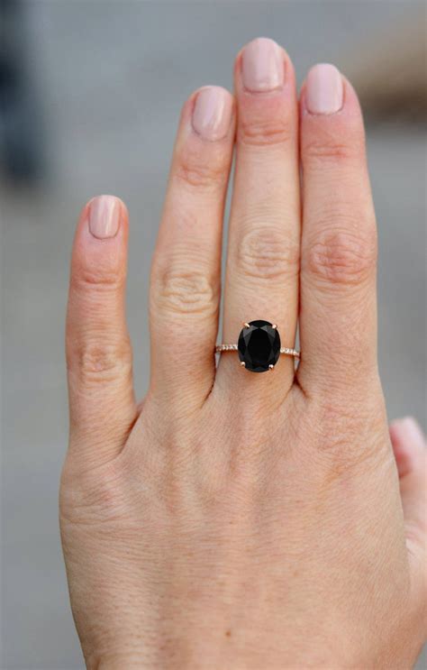Onyx engagement ring. Vintage Black Onyx engagement ring Oval 14K gold Ring unique Cluster kite cut diamond moissanite wedding ring bridal Promise ring for women (67) Sale Price $76.80 $ 76.80 $ 128.00 Original Price $128.00 (40% off) FREE shipping Add to Favorites ... 