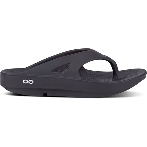 Oofa flip flops. Enjoy comfort all summer long by slipping on the Oomega flip flops from OOFOS. This pair features a casual silhouette and a platform design that to add a bit of height. Crafted with … 