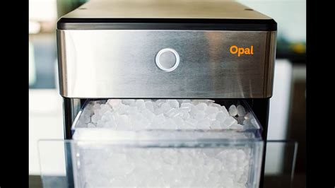 3. Place the ice maker upright on a ﬂat, level surface and plug it in. 4. Install drip tray by sliding it under the front edge of Opal. The tray slots should align with the front feet of Opal. 5. Rinse the ice maker with clean water for ﬁve minutes before ﬁrst use. Start with step 4 of cleaning instructions on page 6.. 
