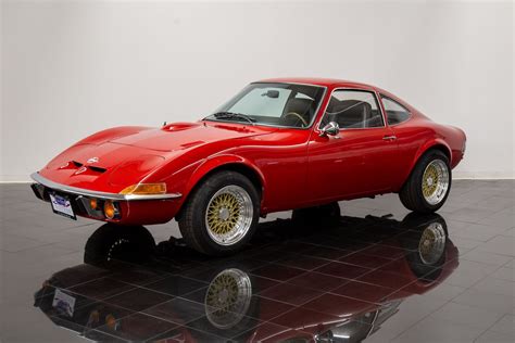 Opel. Production. 1968–1973. 2007–2009. The Opel GT is a front-engine, rear-drive two-seat sports car manufactured and marketed by Opel in two generations — separated by a 34-year hiatus. The first generation Opel GT (1968 [1] –1973) debuted as a styling exercise in 1965 at the Paris and Frankfurt motor shows. [2]. 