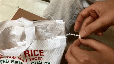 Opening a rice bag - YouTube