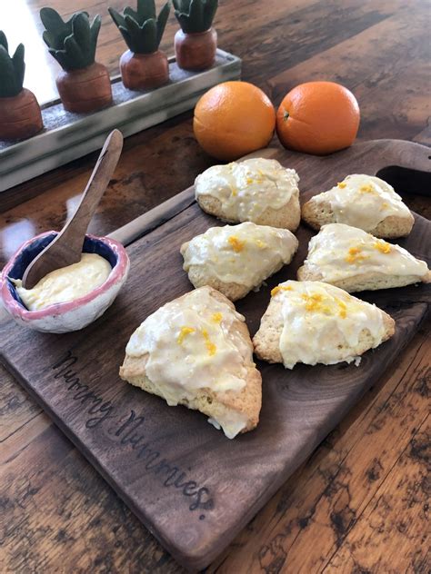 Mom to two little ladies that run her world. These Orange Scones from Joanna Gaines, actually taste like little, orange, sugar cookie cakes. They are divine. And the icing, a must. Start your Easter holiday off with something a little extra-special! Recipe below!. 