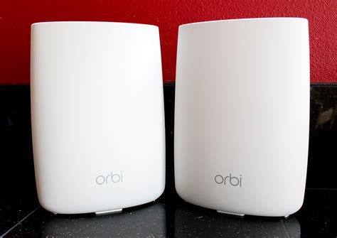 NETGEAR Orbi Quad-Band WiFi 6E Mesh System (RBKE963), Router with 2 Satellite Extenders, Coverage up to 9,000 sq. ft., 200 Devices, 10 Gig Internet Port, AXE11000 802.11 AXE (Up to …. 