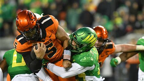 Oregon defeats Oregon State 31-7 for a spot in the Pac-12 title game as rivalry ends for now