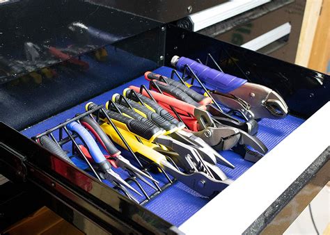 Organization tools. 2. Group Tools by Type and/or Function. Organizing tools by type will make them easier to locate for specific uses. Tool storage cabinets that feature slide-out toolbox drawers typically have areas of different sizes to keep tools within the same family (pliers, ratchets, and files) together. 