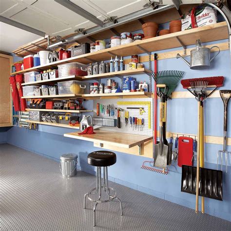 Organize garage. Hang your wheelbarrow on the garage wall to free up floor space. Center a 2-ft. 1×4 across two studs, 2 ft. above the floor. Tack it into place, then drive 3-in. screws through metal mending plates and … 