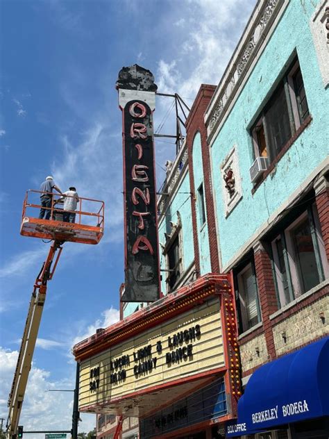 Oriental Theater trying again to restore historic neon sign