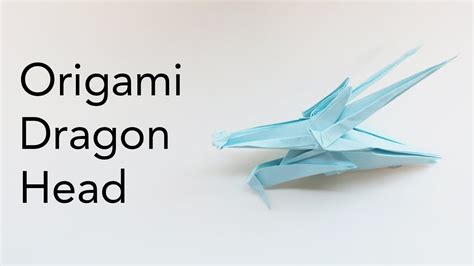 Origami dragon head.  Origami Dragon Head The document provides instructions for m...