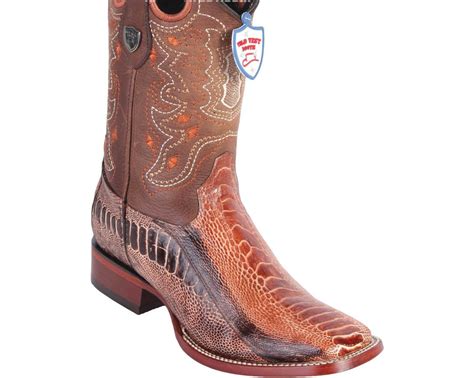 Ostrich leg boots. 12" shaft. Broad square toe. Leather lining. Removable padded insole. Oil and slip resisting rubber outsole. 1 3/4" stockman heel. Style: M4553.WF. Shipping & Returns. All Boots Ship Free. 