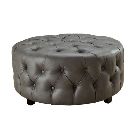 The ottoman features a storage compartment under the lid made secure with a spring hinge. This ottoman has black-finished wood or polymer feet and can fit easily in many areas. Use this storage ottoman at the edge of a bed, as storage in the guest room, a place for shoes or toys in your entryway - wherever needs to be tidier. Overall Shape ....