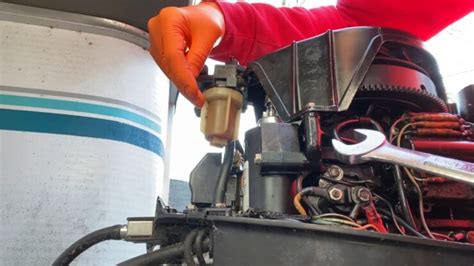 Outboard motor no spark troubleshooting.  Fuel filter is plugged - Change fuel filter.  Ho...
