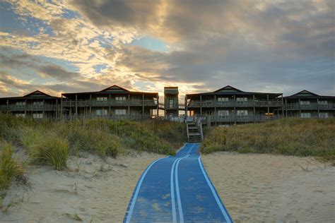 Outer banks beach club resort. Enjoy swimming, surfing, fishing, and other water sports at Outer Banks Beach Club I, located in Kill Devil Hills, North Carolina. Bordered by the Atlantic Ocean, the resort offers two outdoor pools, an indoor pool, and indoor and outdoor spas. Arrangements can be made for guests to windsurf, play golf (seasonal) or tennis, hang glide, and go ... 
