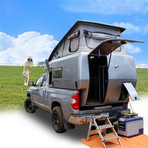 OVRLND pop up campers are huge inside. With more side to side room than any other pop up camper topper and a standing height of over 6'5", this camper is made to store all the adventure equipment you have. Keep the fun going and easily have your camp side friends over for a rainy day meal. With vertical walls and a straight up pop, you gain .... 