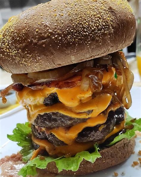 Ox burger. Mad Ox (Chefs Pick) New Addition to The Beef Range, Juicy Beef Burger with sriracha sauce, Fried Onion Rings and Iceberg. Meal includes Cheese In Burger, Fries and Drink: Category: Beef Burgers: PKR 799 
