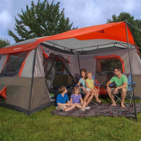Ozark trail 12 person 3 room l-shaped instant cabin tent. The main cabin part is 14 x 8 ft (4.27 x 2.44 m). The private room extension is 8 x 6 ft (2.44 x 1.83 m). But the tent is with an awning, which needs another 8 x 6 ft in front of the entrance doors. This would mean that the ground area is of the shape + or a cross, and the two lengths are 14 and 20 ft. Though you do not need to use the awning ... 