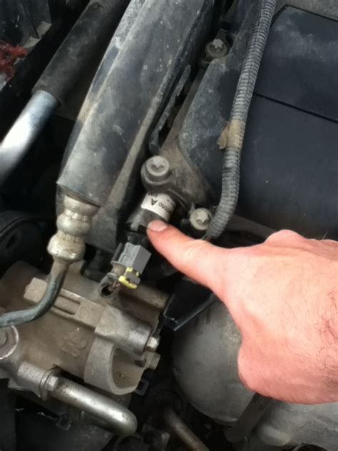 P0014 gmc. Remove the intake/cover. This requires disconnecting a few hoses and removing a few fasteners. Remove the engine cover (remove the oil cap and lift the cover in an upward direction) Locate the ... 