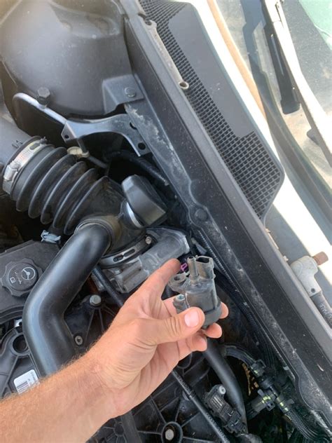 If you're check light is on and you're getting a p0455, p0449 or p0442 you might need to change the Vent Valve Solenoid. Terry shows where the solenoid is lo.... 