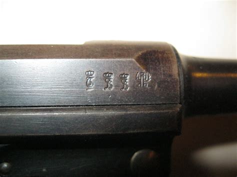 The second thing I observed was that the instrument which strikes Luger witness marks must be extremely thin and extremely sharp, unlike the chisel I had at hand. Test strike #1 on the example picture is actually a double strike, because on the first strike the chisel moved too far back onto the receiver.. 