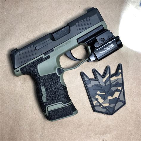 The P365-AXG LEGION’s grip module is fitted with exclus