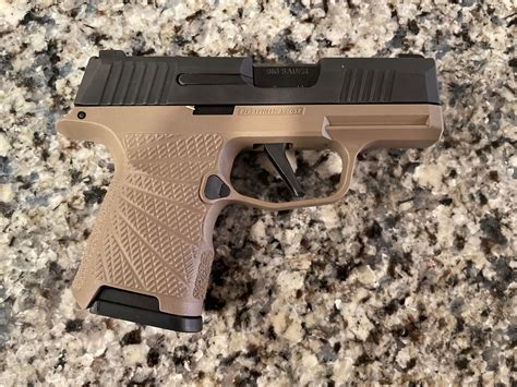 P365 lower. Photo Source: Gun Critic. P365 XL uses an X/XL grip module and a slide that is roughly 6.3” lengthwise. With the extended beavertail the P365XL comes in at 6.6” in length. 3.7” barrel. 6.6” overall length. 1.1” width. 12 round capacity for flush fitment with grip. 15 round magazines are also available. 