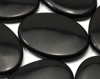 Palm Stone Volcanic Glass - Etsy - muktibox.com