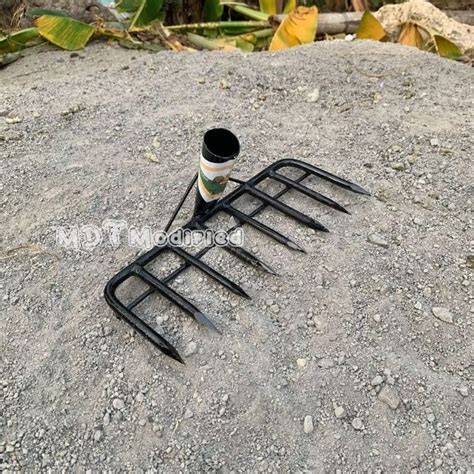 Penggaruk sampah dari besi - raincitystudios.com