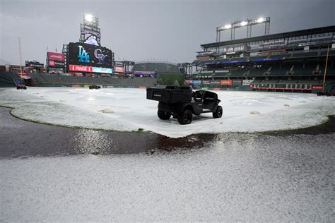 PHOTOS: Coors Field gets heavy hail dump before Rockies game vs. Dodgers