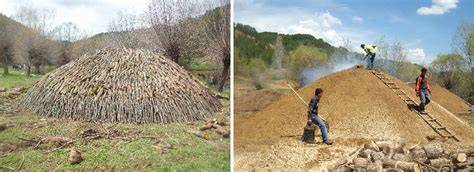 Preparation of traditional earth mound kilns. - raincitystudios.com