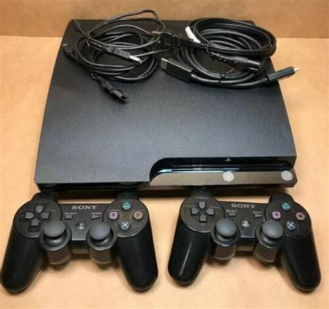 PS3 Slim + 2 controllers + remote + games - video gaming - by …