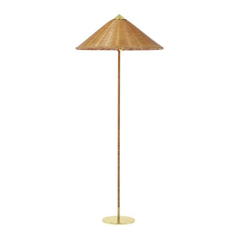 09-03-2021 - Originally designed by Paavo Tynell in 1935, this authorized GUBI re-edition is executed in brass, rattan and a fabric shade with brass finial. The 9…