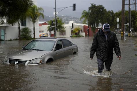 Pacific storm that unleashed coastal flooding pushes across Southern California into Arizona