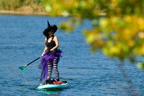 Paddleboarders dressed as witches will haunt Colorado lakes; here’s how to join them