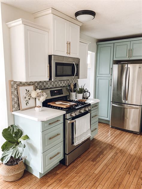 Paint for kitchen cabinets. Favorite white paint colors for the kitchen include White Dove OC-17, Silver Satin OC-26, and seen here, Vanilla Ice Cream OC-90. 5. Add Beachy Energy with Refreshing Kitchen Paint Colors. Bring island vibes to your kitchen with a rejuvenating hue on your cabinets. 