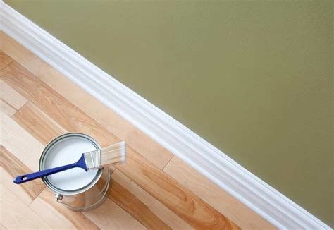 Paint on trim. Prep the Surface. Remove any mildew by scrubbing the area with a 3:1 water and bleach solution. Keep the area wet for about 20 minutes, then rinse. Next, clean the object thoroughly with detergent and warm water. Rinse and let dry. To help the paint stick better, scuff-sand the surface with 200-grit sandpaper. 