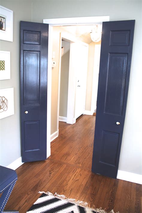 Painting interior doors. Black interior doors are a chic statement, and in general won’t shrink your room. Going black does require a little additional upkeep. Choose Sherwin Williams Tricorn Black, Benjamin Moore Black, or Valspar Cracked Pepper for the ultimate dark doors. Use a foam roller for the best finish without fancy spray equipment. 