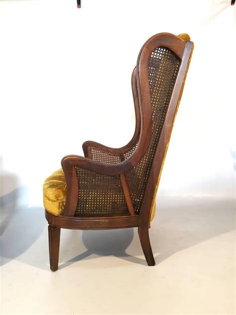 Pair of Lewittes Wingback Chairs with Pressed Cane