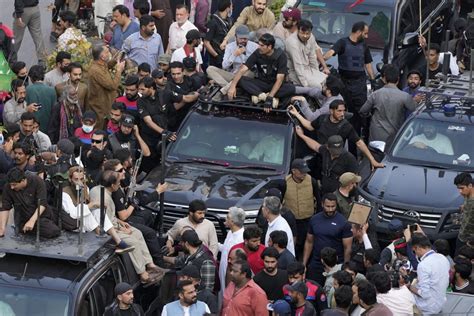 Pakistan’s ex-PM Khan leads rally, ignores arrest warrants