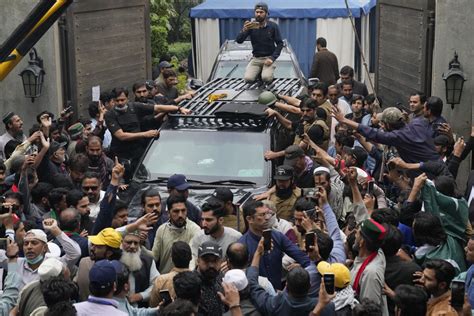 Pakistani police storm home of former PM Khan, arrest 30