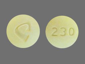 The 230 pill is a round yellow-colored pill with a "23