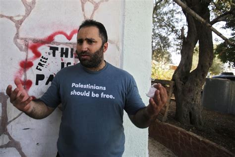 Palestinian activist is expelled by Israeli forces from his home in a volatile West Bank city
